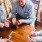 A group of friends playing dominos 